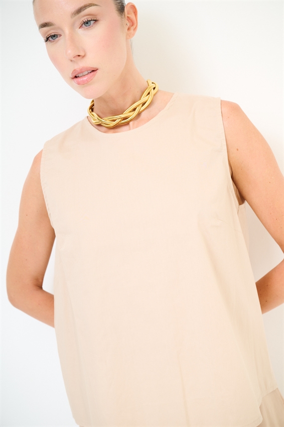 TOP SMANICATO CON BOTTONI DIETRO