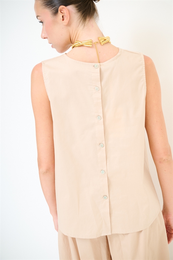 TOP SMANICATO CON BOTTONI DIETRO