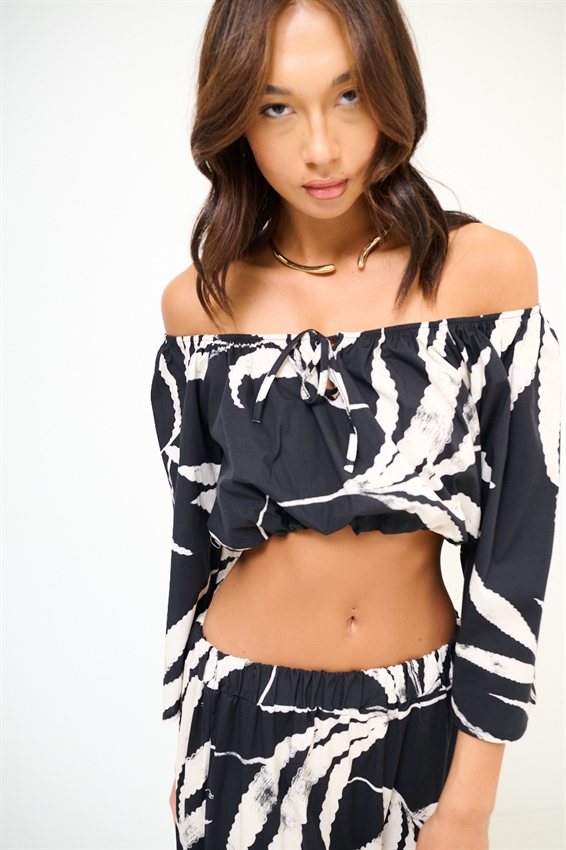 TOP CON ELASTICO SCOLLO STAMPA