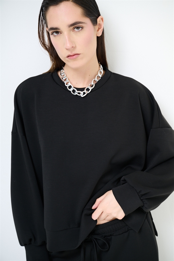 FELPA PARICOLLO OVERSIZE CON SPACCHI IN MODAL NERO