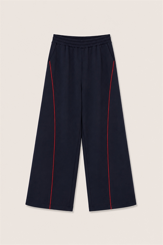 PANTA TUTA CON PIPING