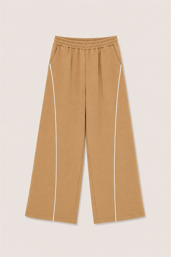 PANTA TUTA CON PIPING