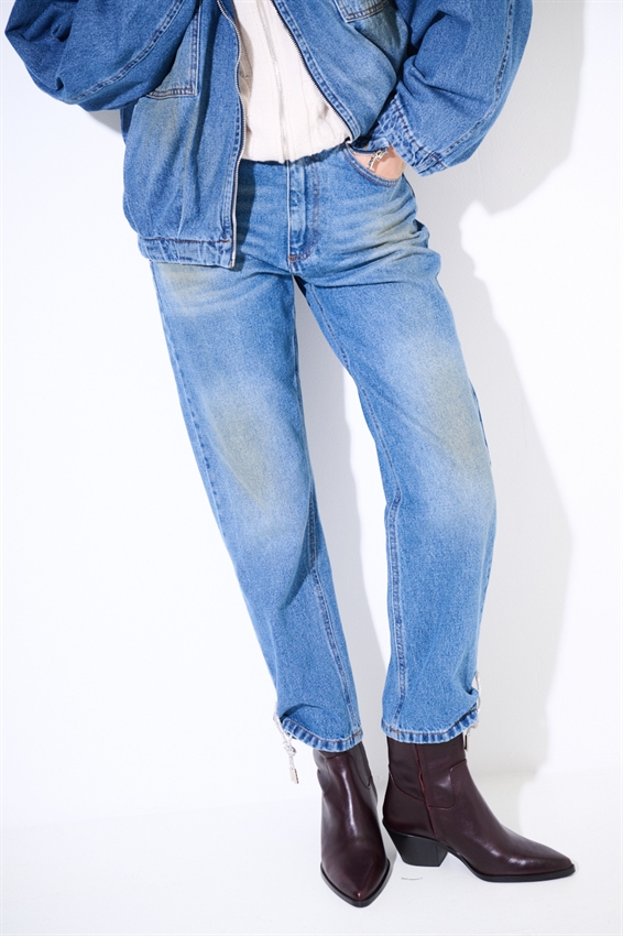 JEANS SABBIATO CON LACCI STRASS FONDO