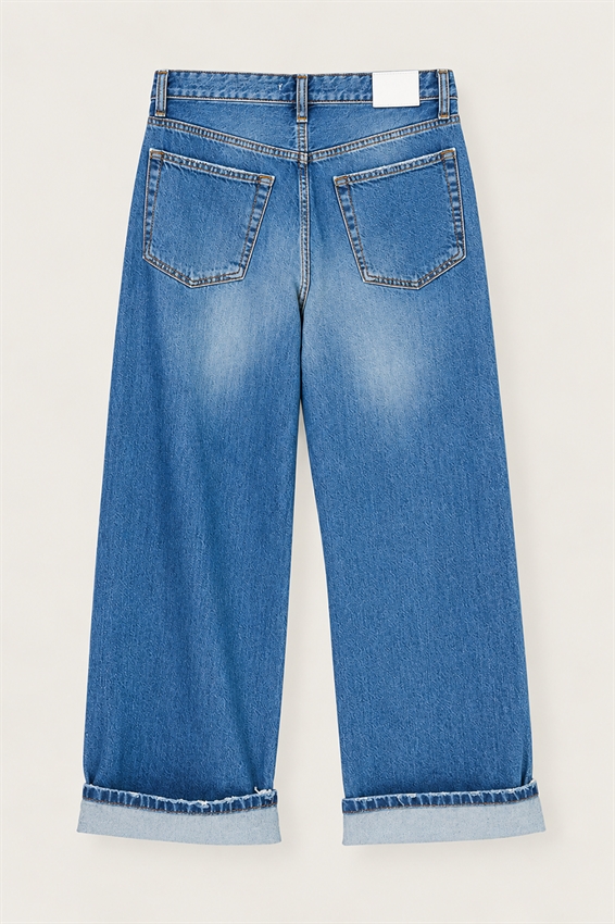 JEANS RISVOLTO CON ROTTURE