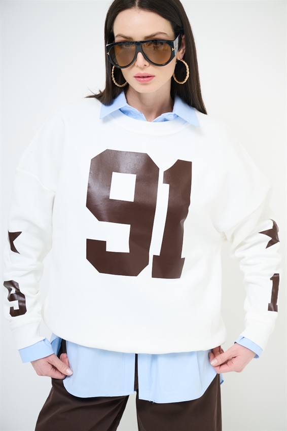 FELPA OVER STAMPA 91 GLOW IN THE DARK PANNA