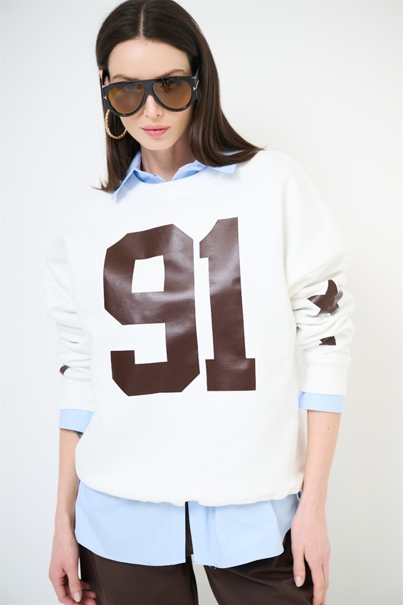 FELPA OVER STAMPA 91 GLOW IN THE DARK PANNA