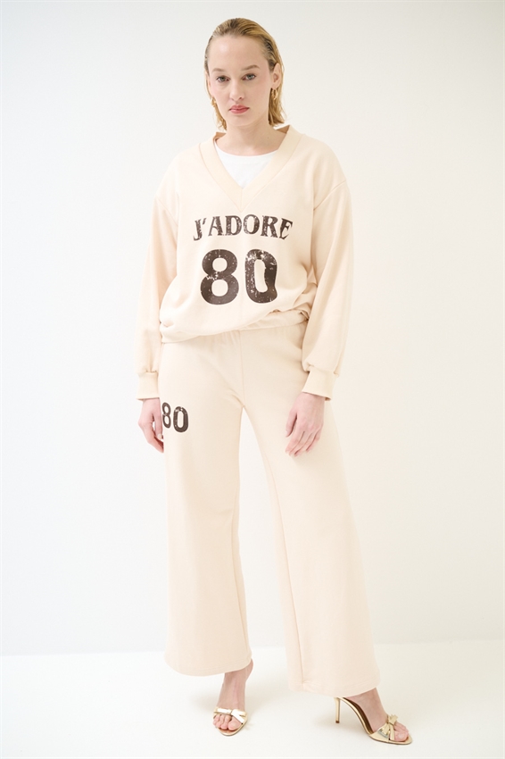 PANTALONE DRITTO IN FELPA CON STAMPA NOCCIOLA