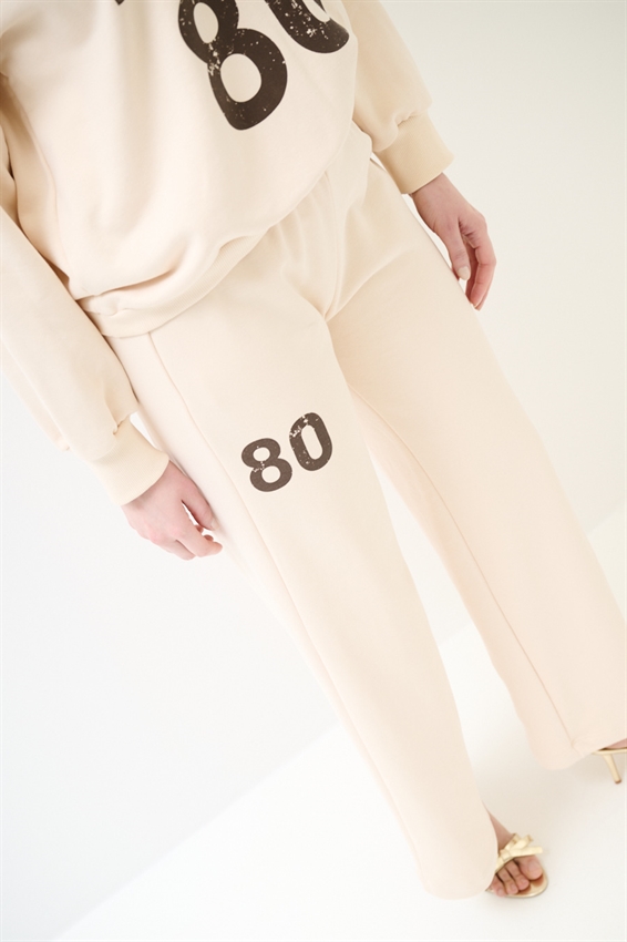 PANTALONE DRITTO IN FELPA CON STAMPA NOCCIOLA