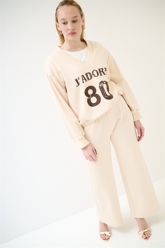 PANTALONE DRITTO IN FELPA CON STAMPA NOCCIOLA