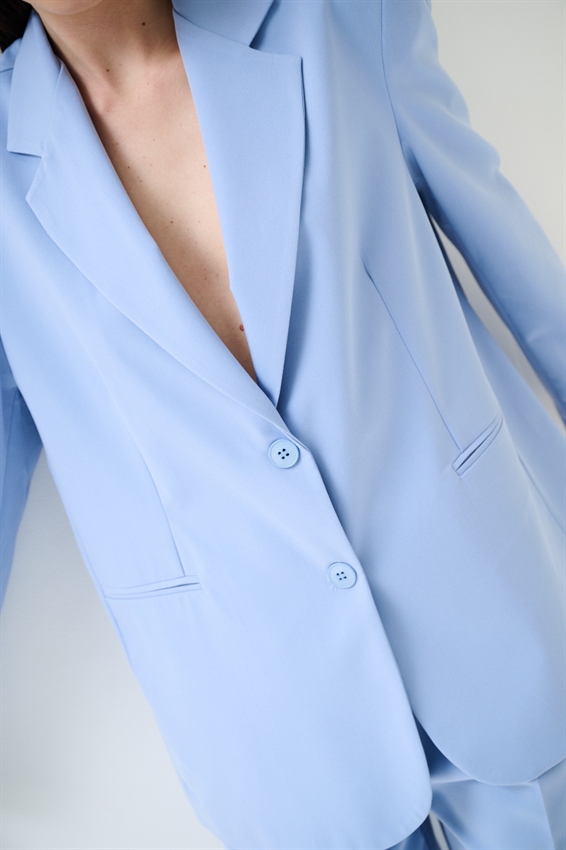 GIACCA OVER CON TASCHE A FILETTO CELESTE